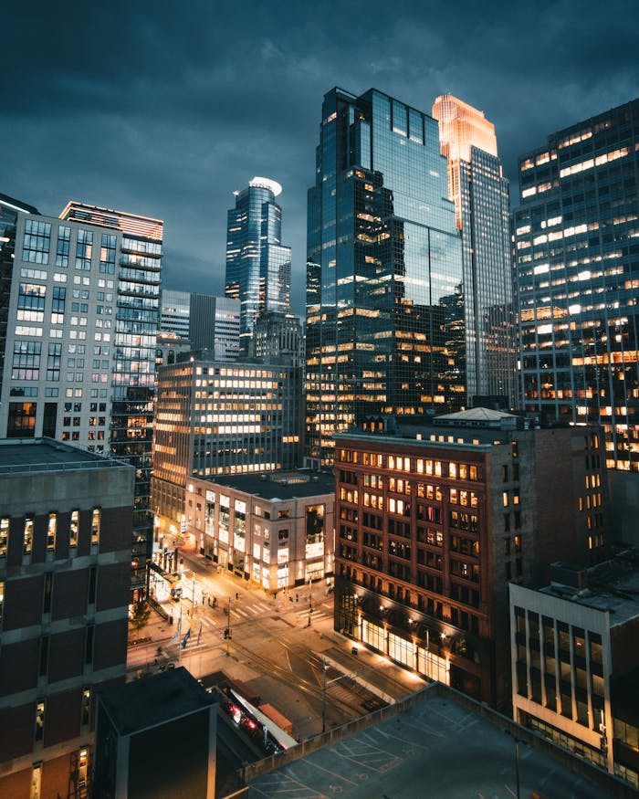 Stunning night view of downtown Minneapolis with illuminated skyscrapers.